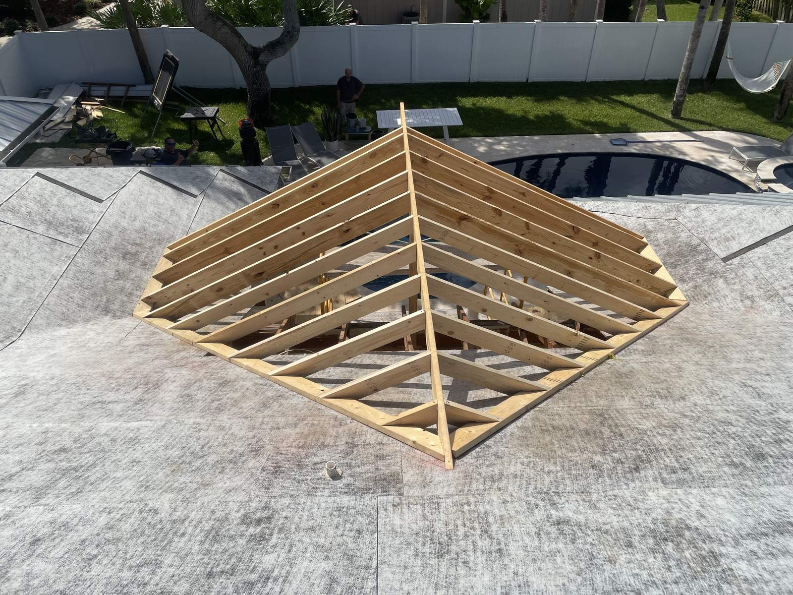 New gable framed and tied into an existing roofline during an addition